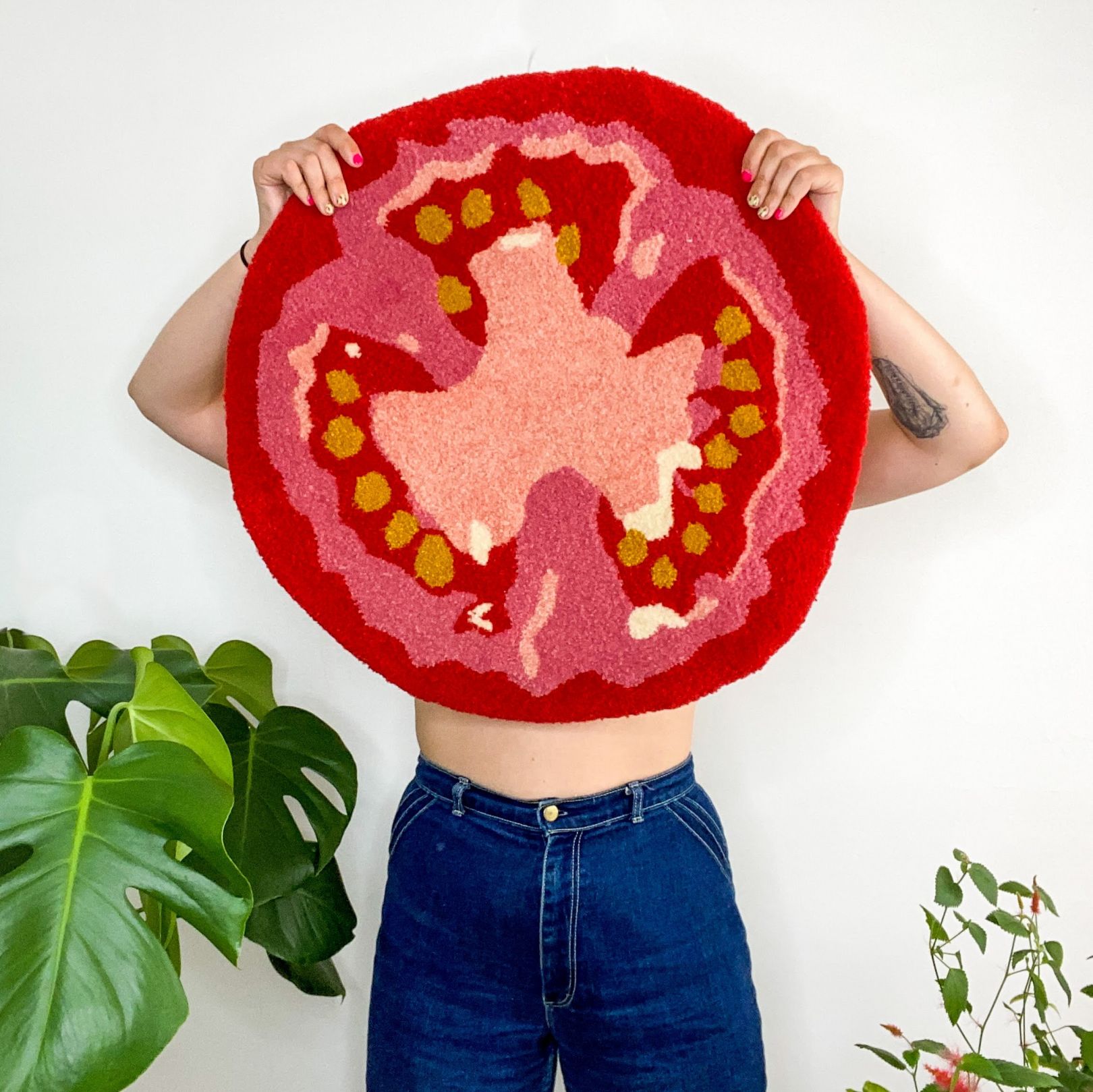 hand-hooked rugs and wall hangings of cheeky candy, cocktails and citrus fruit by Hanna Eidson