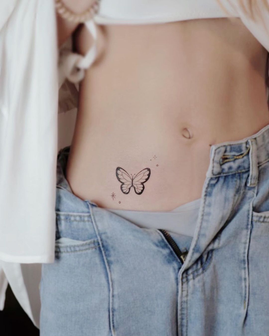 minimal butterfly Tattoo