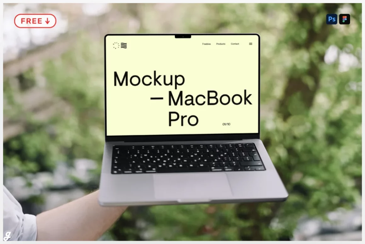 Free Arm Holding MacBook Pro Mockup