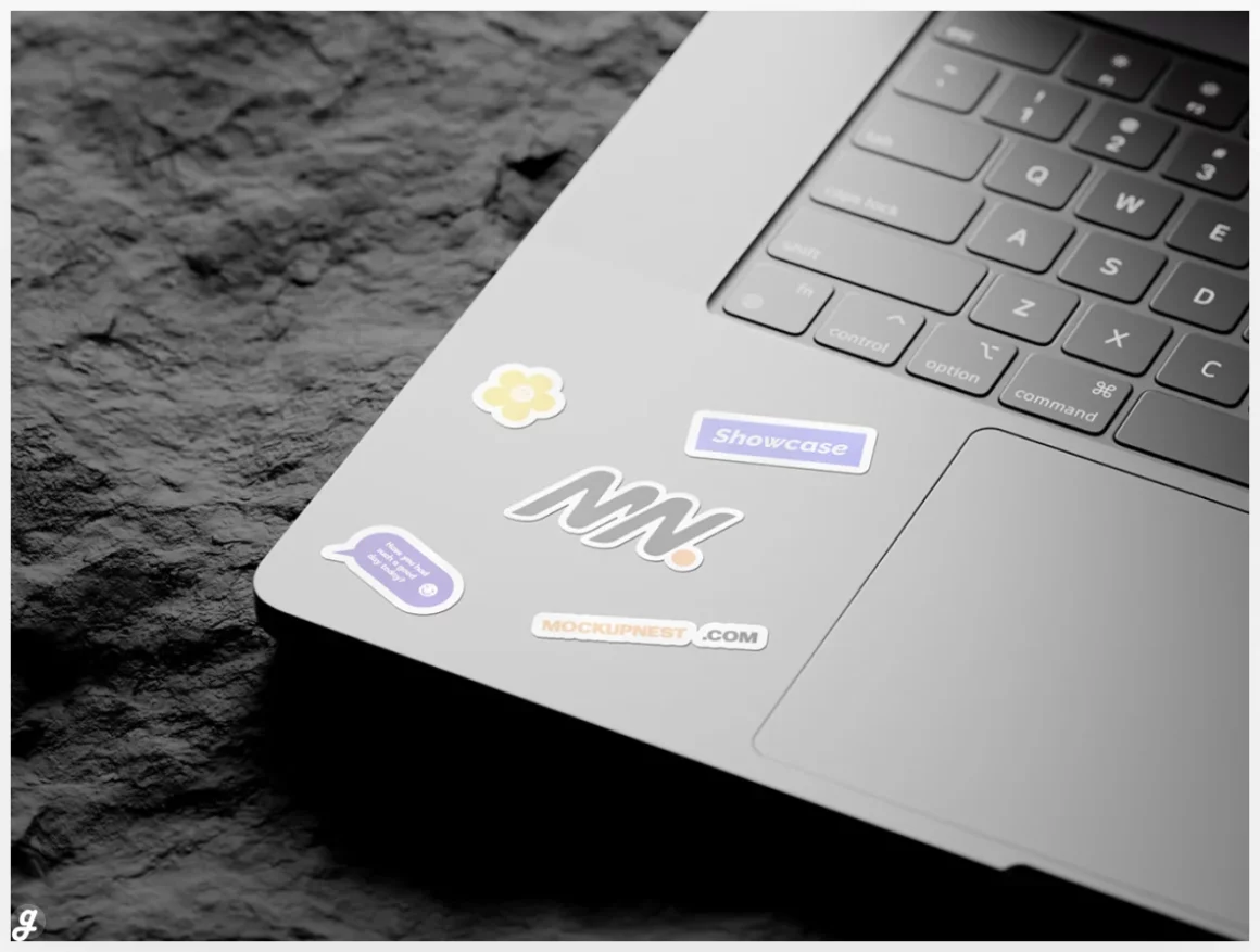 Free Laptop Sticker On Rock Mockup