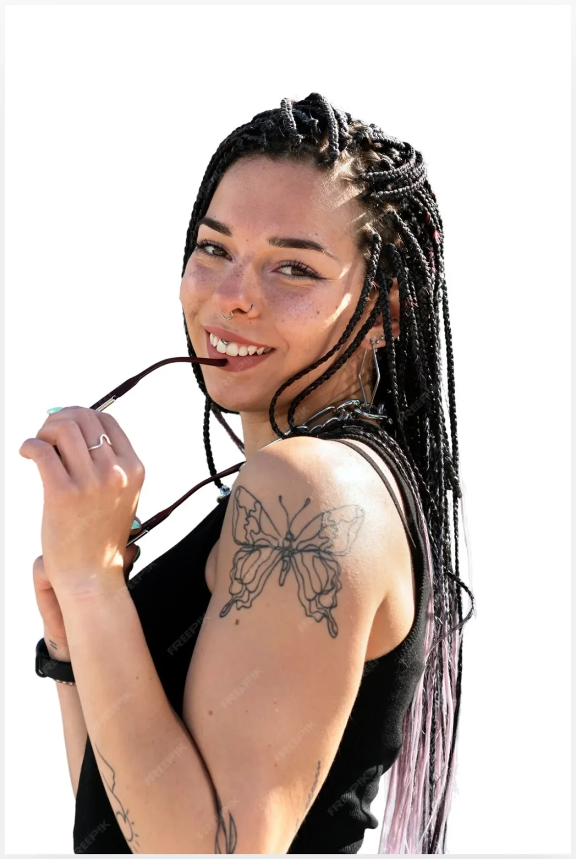 Portrait of person with chain necklace with Tattoo