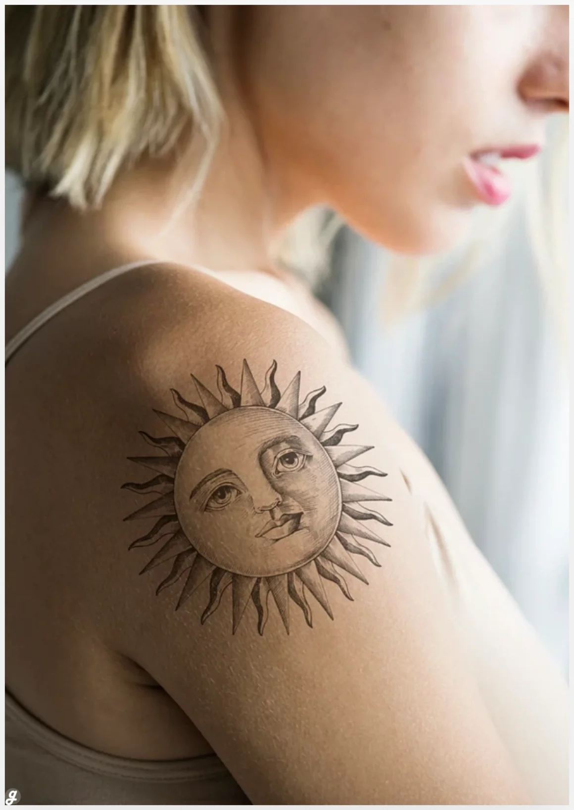 Closeup of tattooed shoulder of a woman